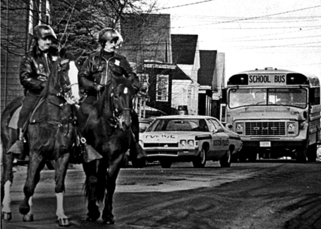 Boston Police on horseback stand guard for trouble in South Boston, MA, in fall of 1974 during forced busing to racially integrate the schools. Peter Bregg/AP