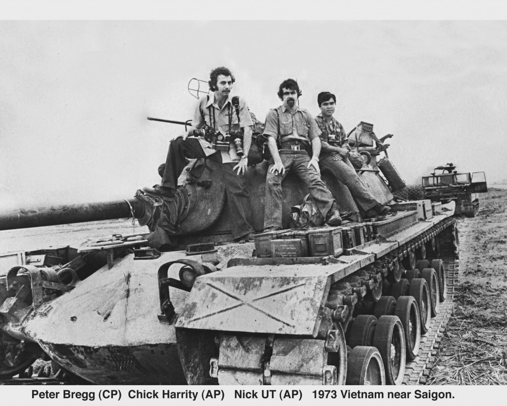 Peter Bregg with AP Photographers Nick Ut  and Chick Harrity south of Saigon, South Vietnam in 1973 while on patrol with South Vietnamese soldiers. Ut won the Pulitzer for his photo of Kim Phuc running down a highway after napalm strike burned off her clothes in 1972.