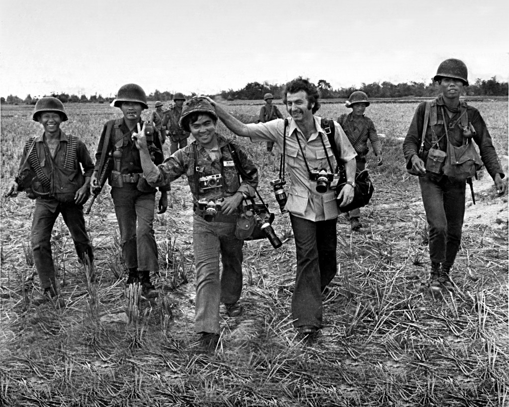 Peter Bregg with AP Photographer Nick Ut south of Saigon, South Vietnam in 1973 while on patrol with South Vietnamese soldiers. Ut won the Pulitzer for his photo of Kim Phuc running down a highway after napalm strike burned off her clothes in 1972.