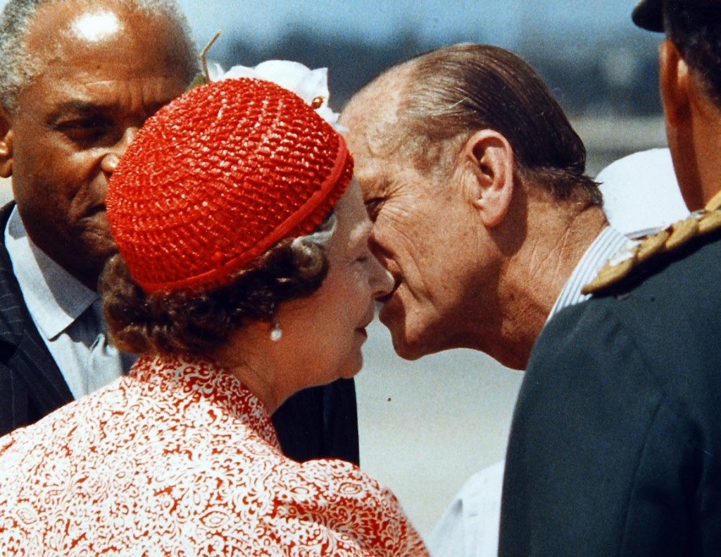 The Queen gets a farewell kiss from husband Prince Phillip as they prepare to depart Barbados in 1989. They were leaving on separate planes which is why they kissed in public. Peter Bregg