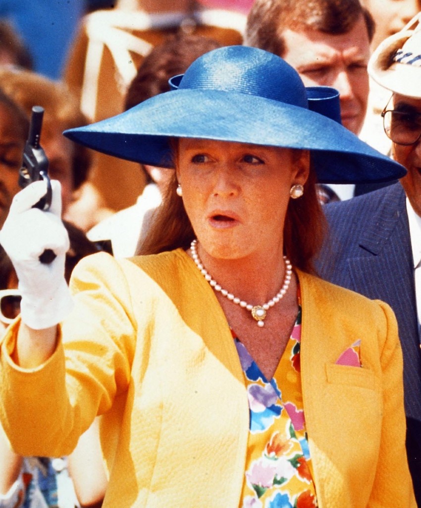 Duchess of York Sarah Ferguson reacts to a misfire on a starting pistol in Toronto at start of a walkathon in 1990. Peter Bregg